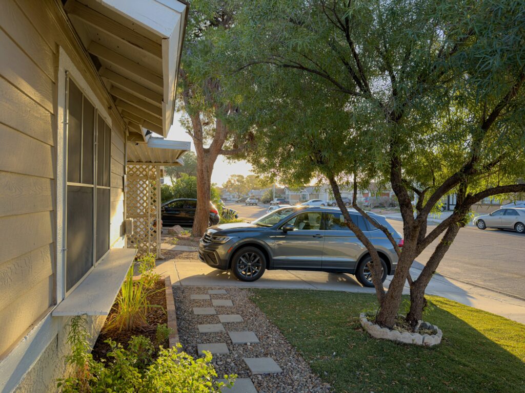 SUV parked beside a suburban home