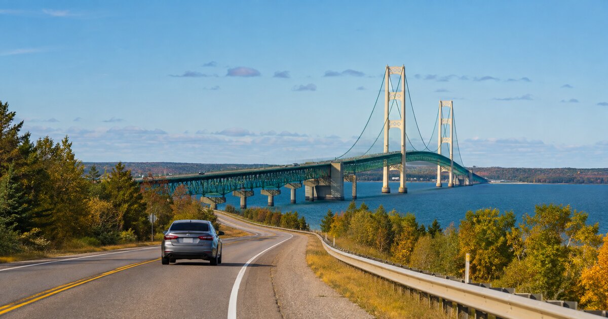 Car traveling on a Michigan road near the Mackinac Bridge
